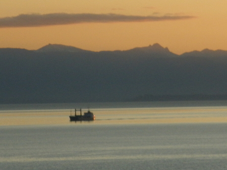 Fishing boat at sunset